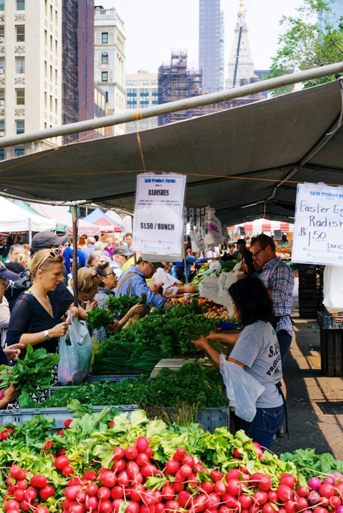 A busy farmers market on a Saturday morning